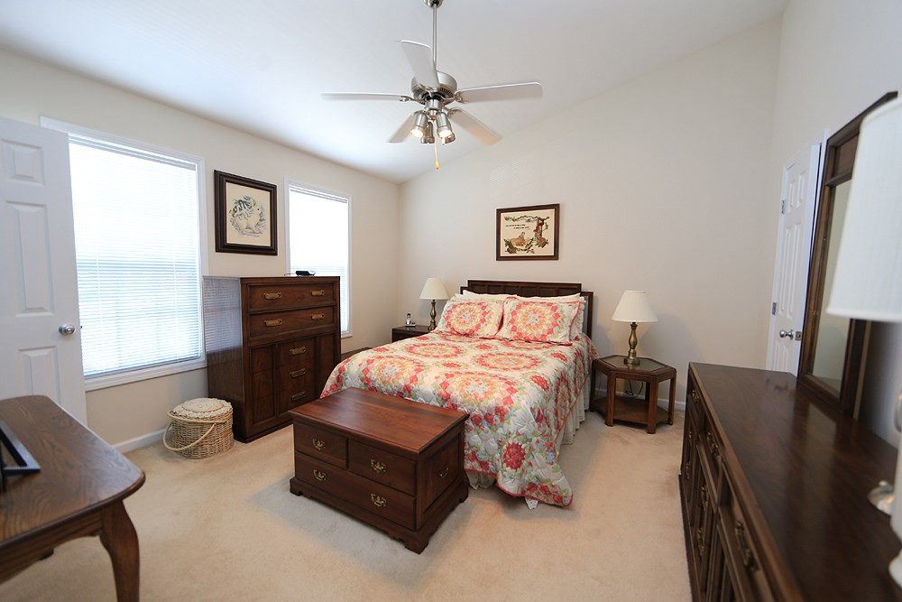 2041 Rivergate Road, Unit 103 Raleigh, NC 27614 - Photo 10 of 21 Master suite offers a cathedral ceiling, fan and two custom walk-in closets! Master Bedroom