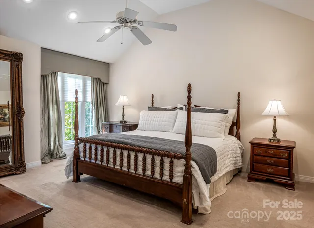 a bed room with a bed and a lamp