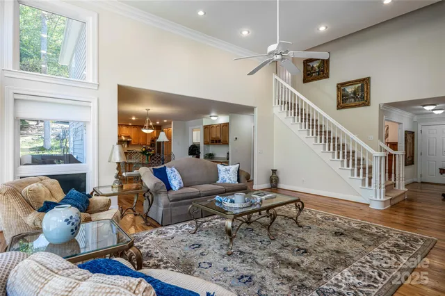 a living room with furniture and a rug