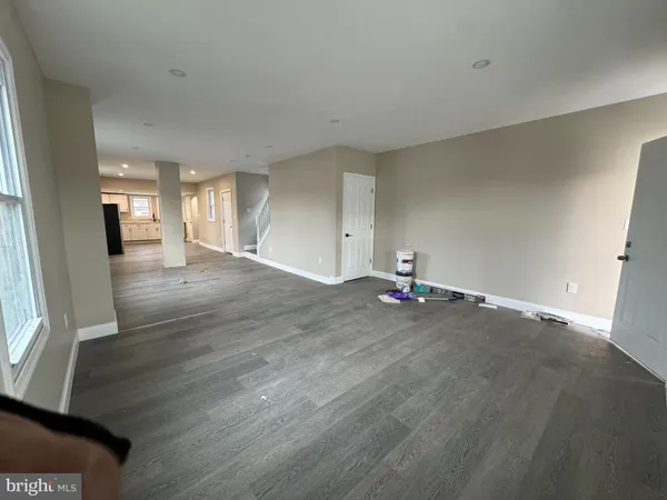 a view of a livingroom with wooden floor