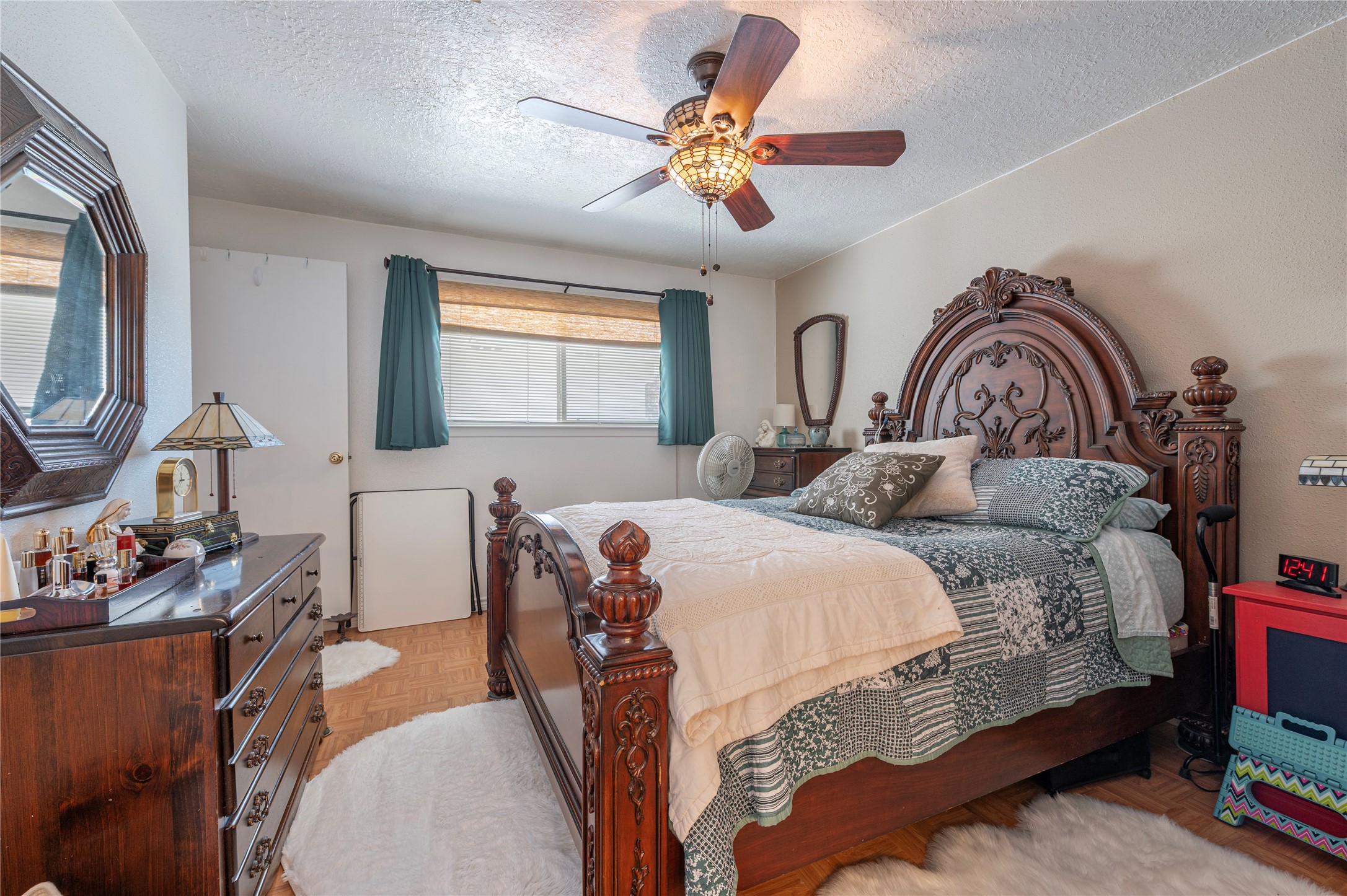 10107 Rocky Hollow Road La Porte, TX 77571 - Photo 15 of 33 a bedroom with two beds and a window