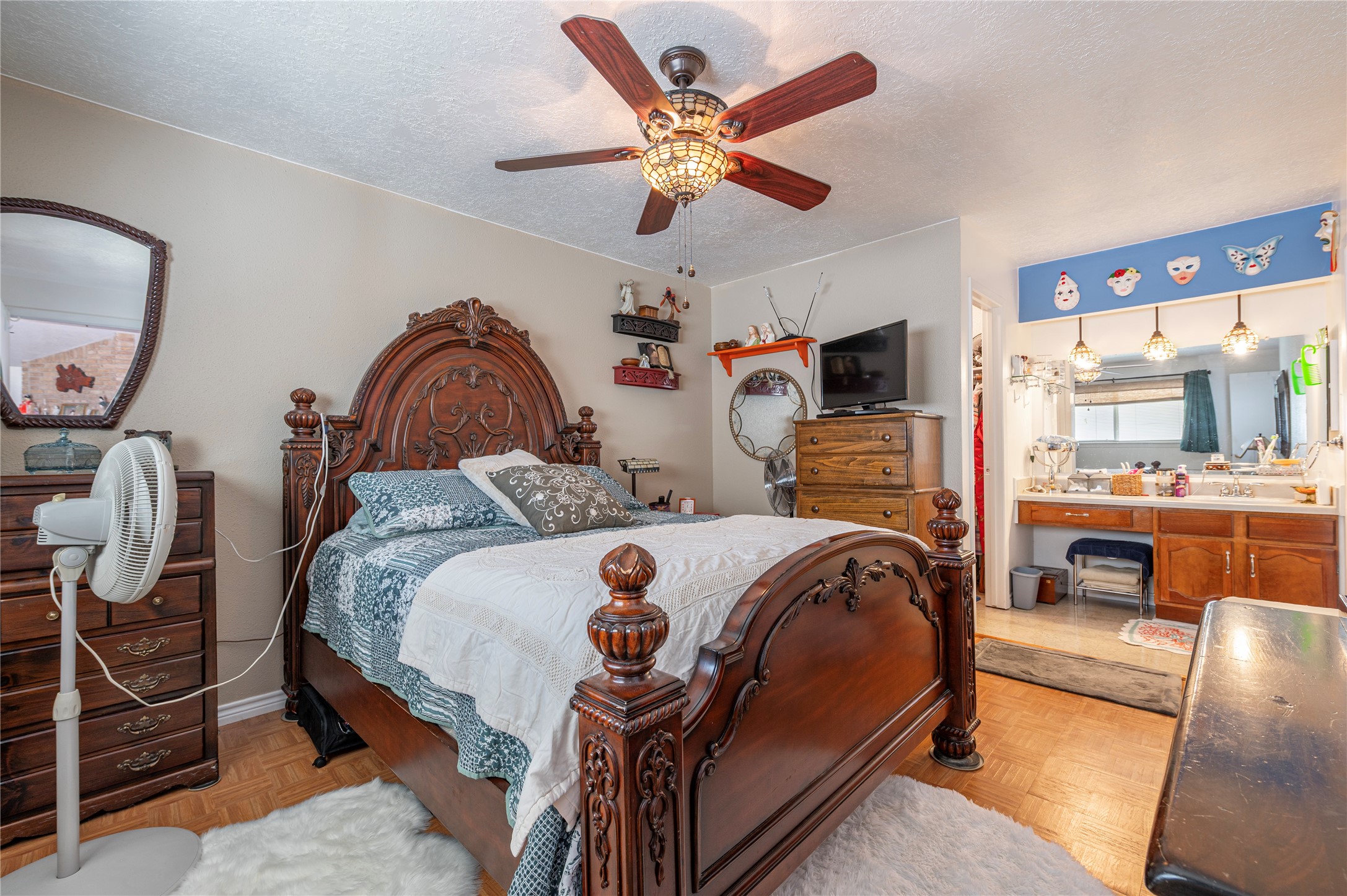 10107 Rocky Hollow Road La Porte, TX 77571 - Photo 16 of 33 a bedroom with a bed and wooden floor