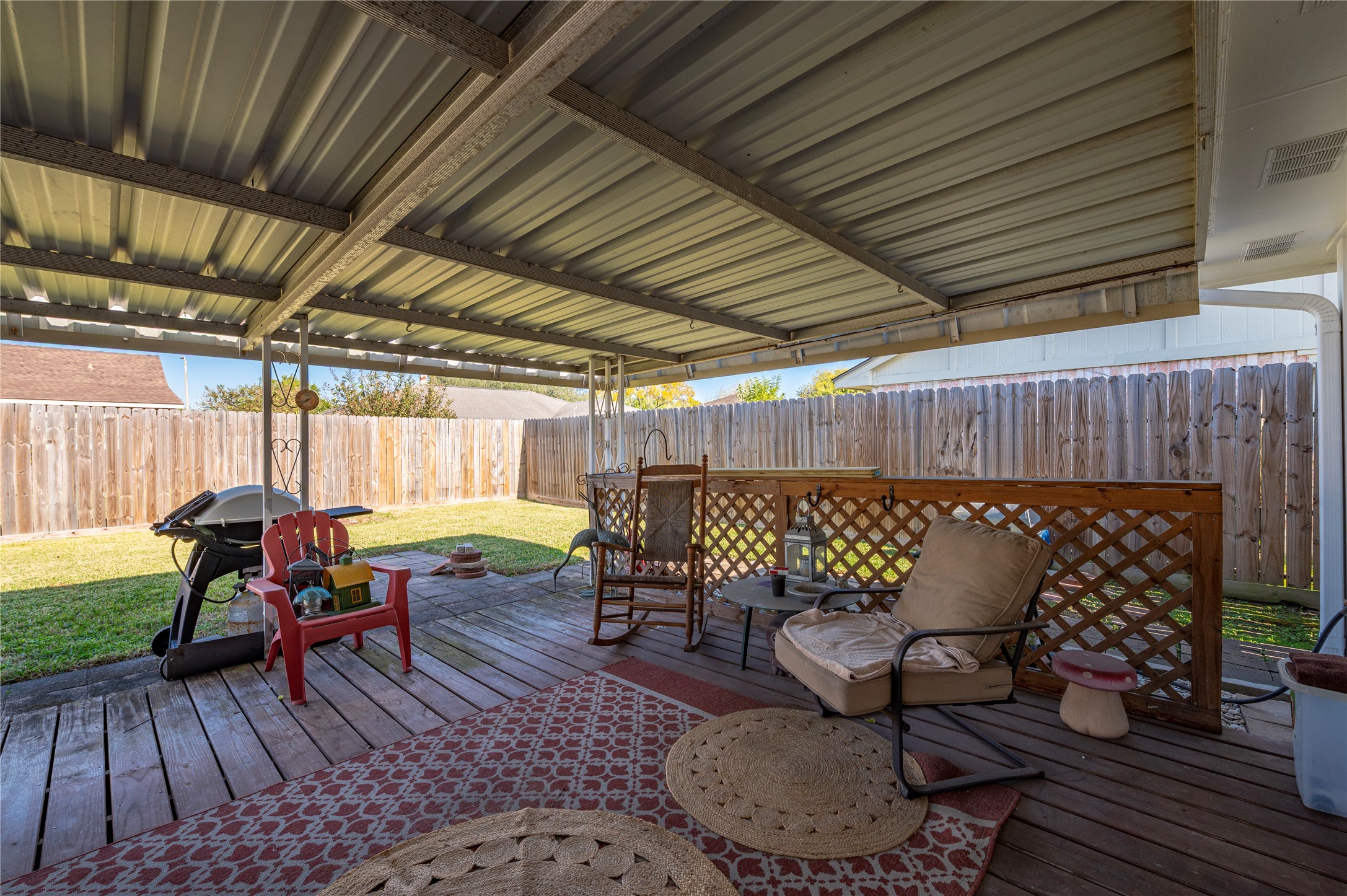10107 Rocky Hollow Road La Porte, TX 77571 - Photo 26 of 33 a outdoor space with patio lots of furniture