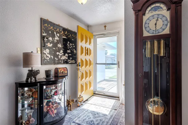 a view of a hallway with elevator