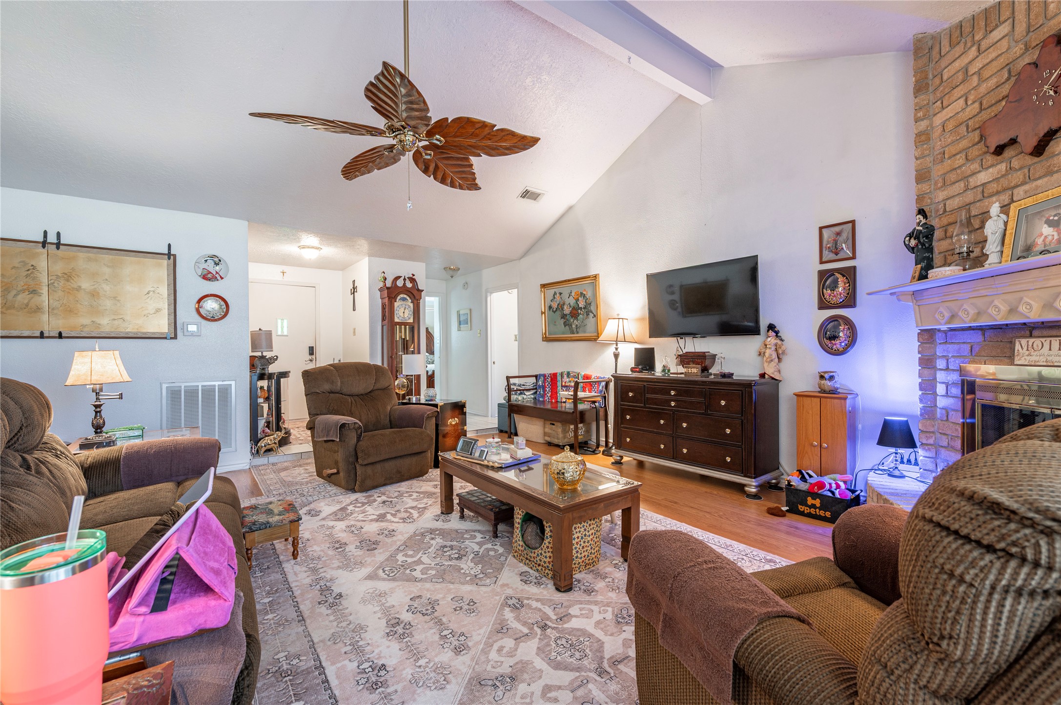 10107 Rocky Hollow Road La Porte, TX 77571 - Photo 8 of 33 a living room with furniture a flat screen tv and a window