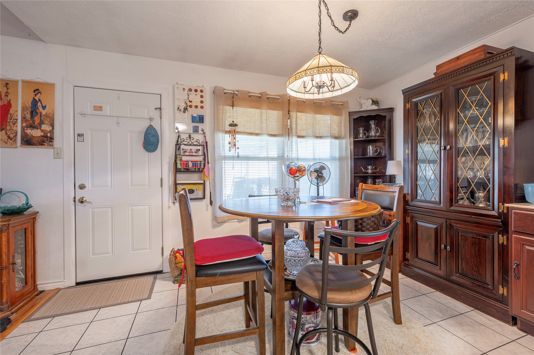 10107 Rocky Hollow Road La Porte, TX 77571 - Photo 10 of 33 a view of a dining room with furniture window and wooden floor