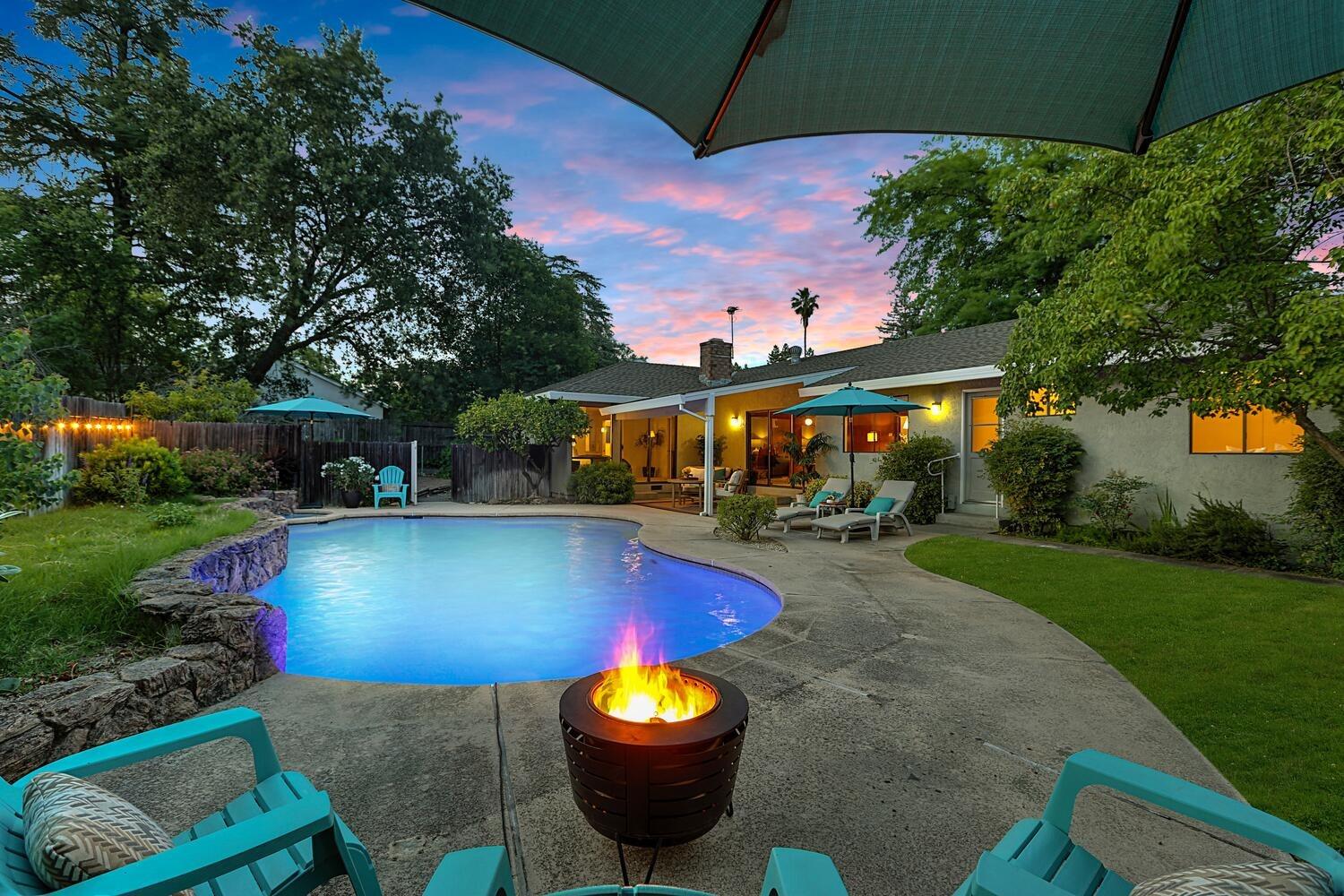 a view of a swimming pool with a patio