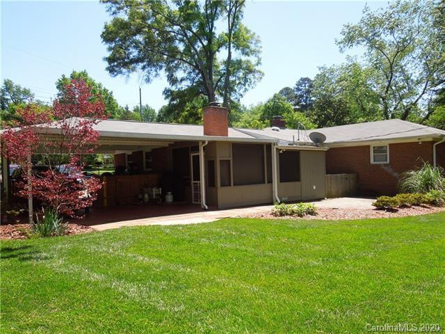 5531 Hickory Grove Road Charlotte, NC 28215 - Photo 3 of 24 a view of a house with a garden
