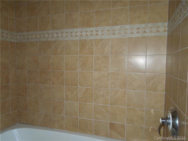 5531 Hickory Grove Road Charlotte, NC 28215 - Photo 22 of 24 a bathroom with a shower