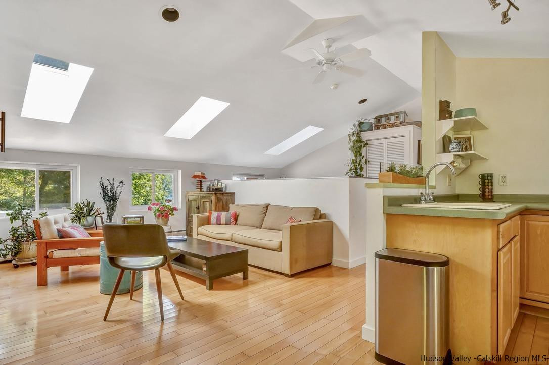 71 Carly Road Woodstock, NY 12498 - Photo 22 of 34 a living room with furniture and a wooden floor