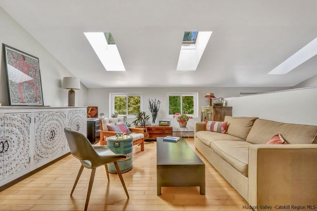 71 Carly Road Woodstock, NY 12498 - Photo 24 of 34 a living room with furniture and a large window