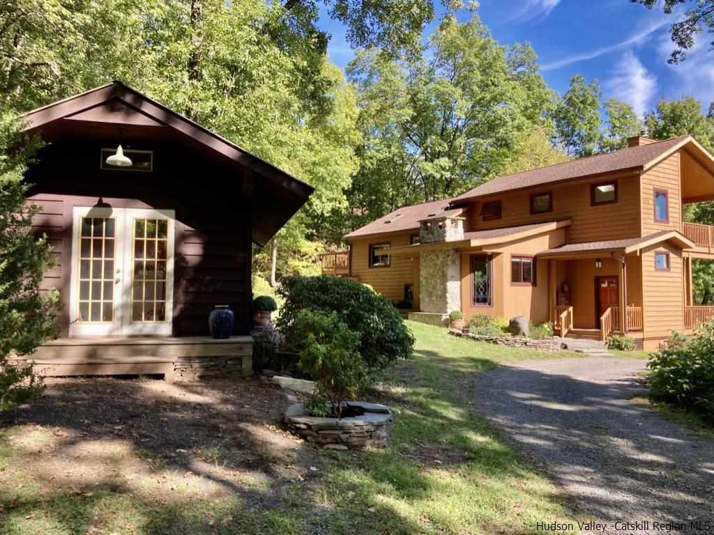 71 Carly Road Woodstock, NY 12498 - Photo 28 of 34 a front view of a house with garden