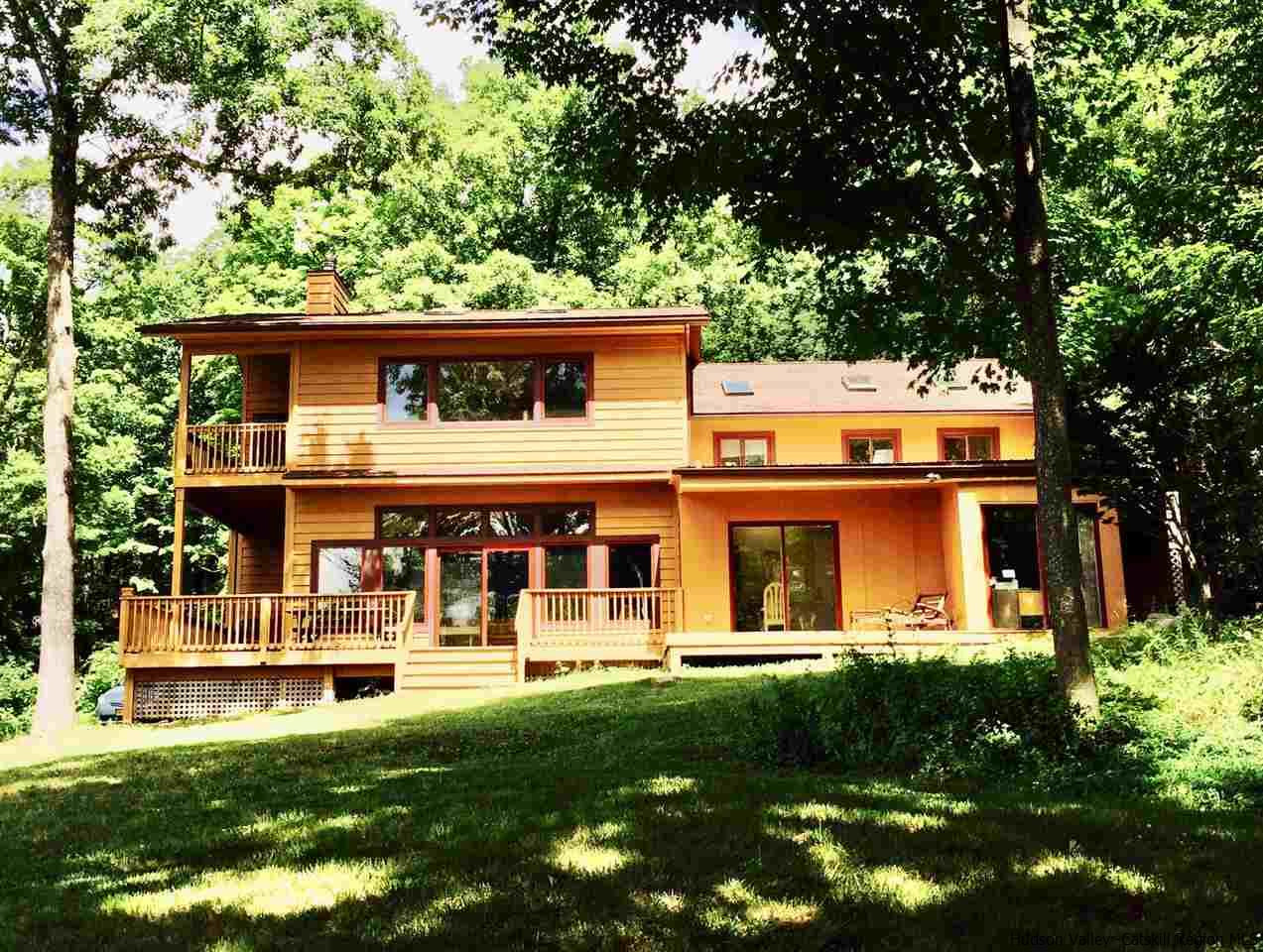 71 Carly Road Woodstock, NY 12498 - Photo 29 of 34 front view of a house with a yard