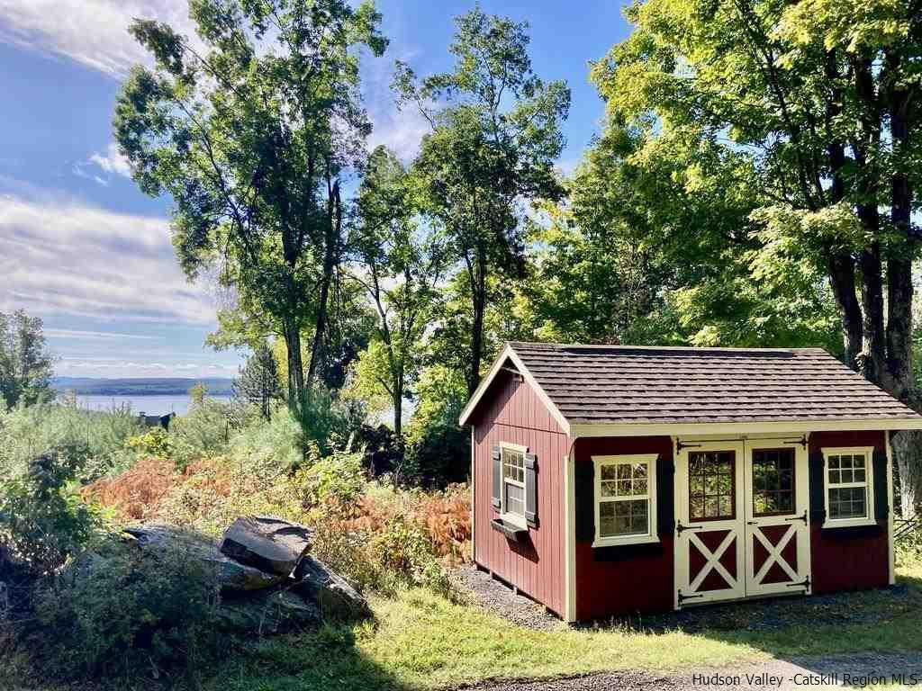 71 Carly Road Woodstock, NY 12498 - Photo 31 of 34 a front view of a house with garden