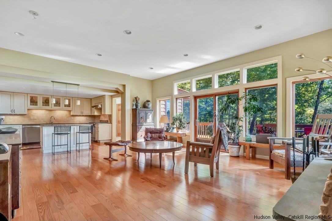 71 Carly Road Woodstock, NY 12498 - Photo 4 of 34 a living room with furniture and floor to ceiling windows