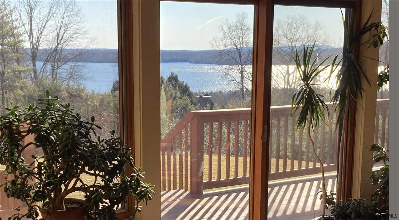 71 Carly Road Woodstock, NY 12498 - Photo 6 of 34 a view of a balcony with a tree