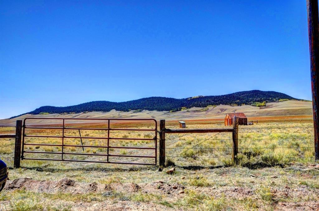 565 Bar D Road Fairplay, CO 80440 - Photo 1 of 17 a view of a large mountain with a view of outdoor space