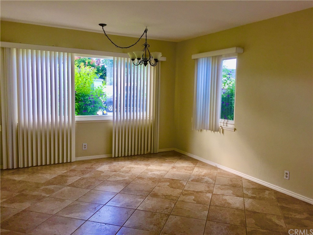 970 Linden Place Costa Mesa, CA 92627 - Photo 7 of 9 a view of an empty room with a window