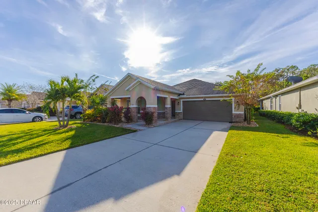 a view of a room with window wooden floor and chandelier