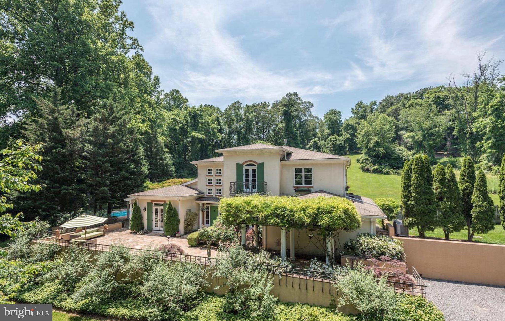 1127 Bellview Road McLean, VA 22102 - Photo 1 of 67 a front view of a house with a yard