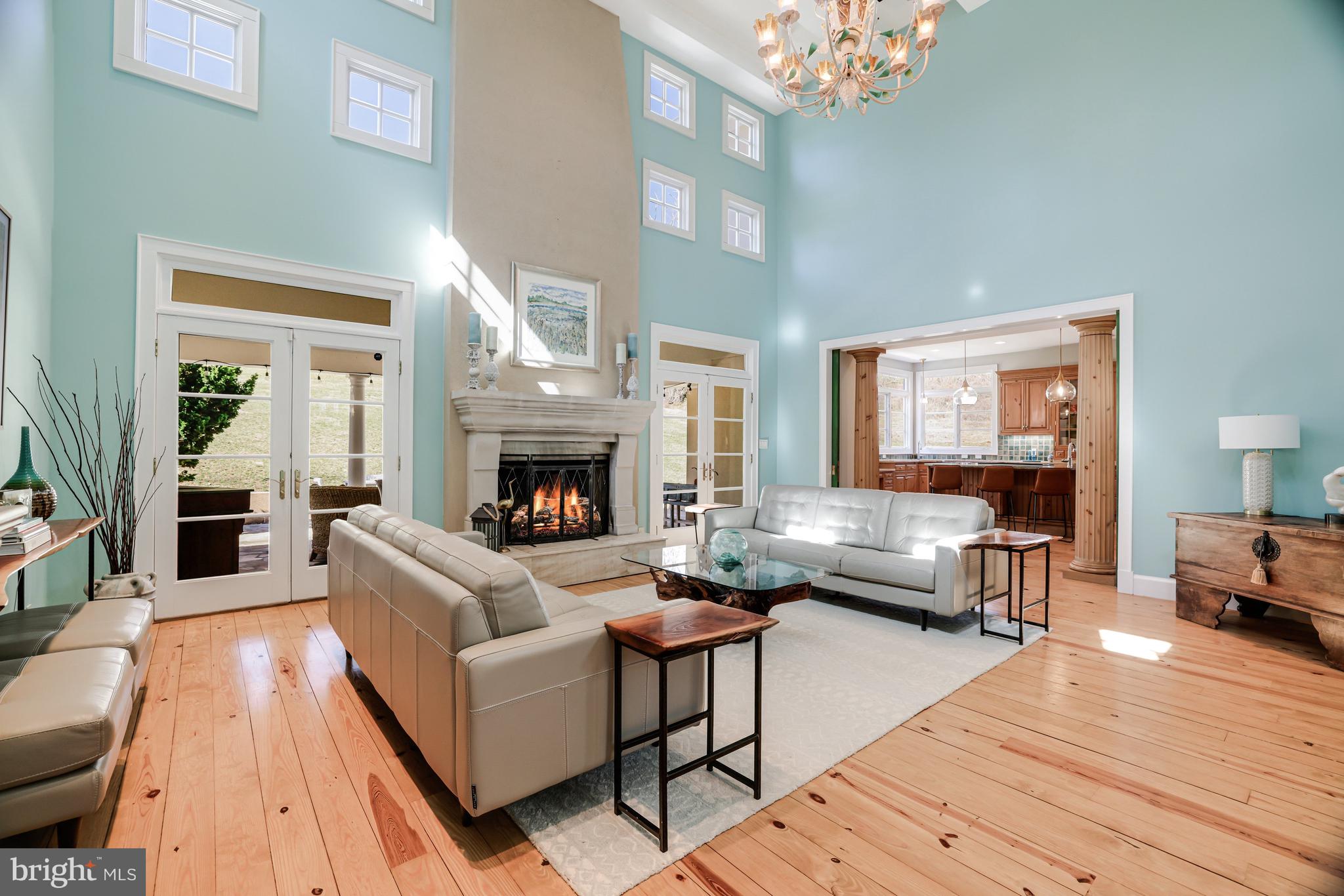 1127 Bellview Road McLean, VA 22102 - Photo 13 of 67 a living room with furniture and a fireplace