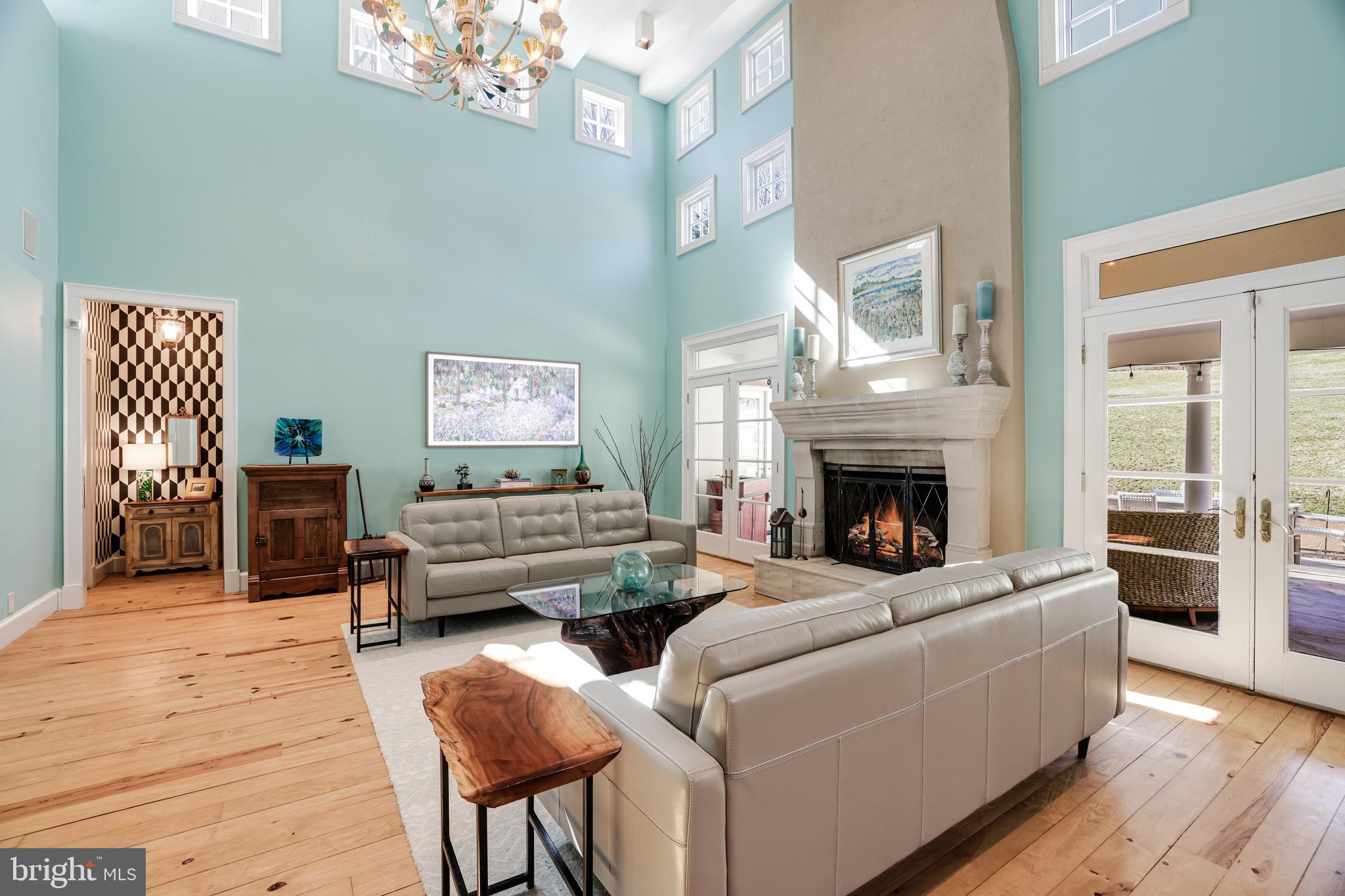 1127 Bellview Road McLean, VA 22102 - Photo 15 of 67 a living room with furniture and a fireplace