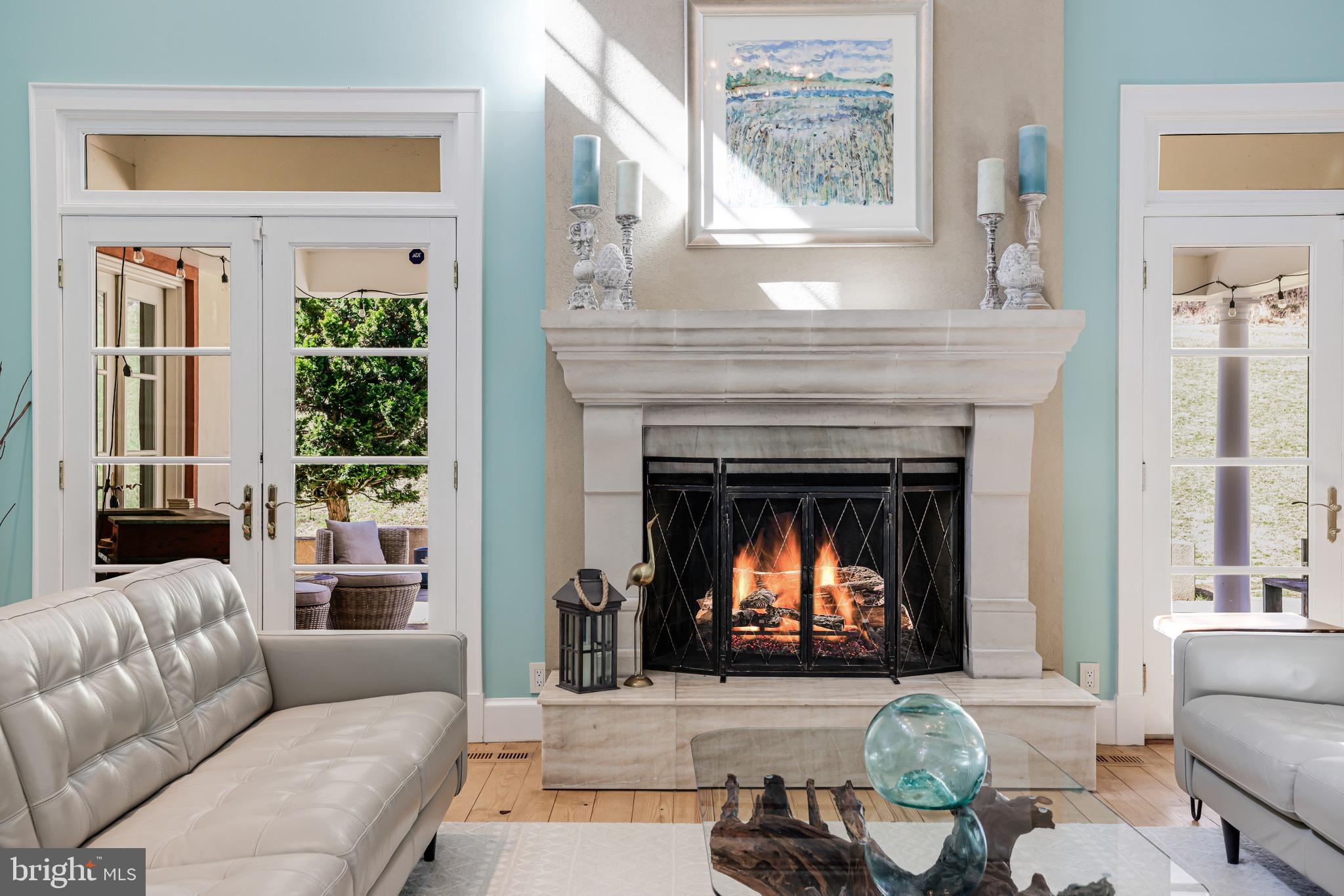 1127 Bellview Road McLean, VA 22102 - Photo 23 of 67 a living room with furniture and a fireplace