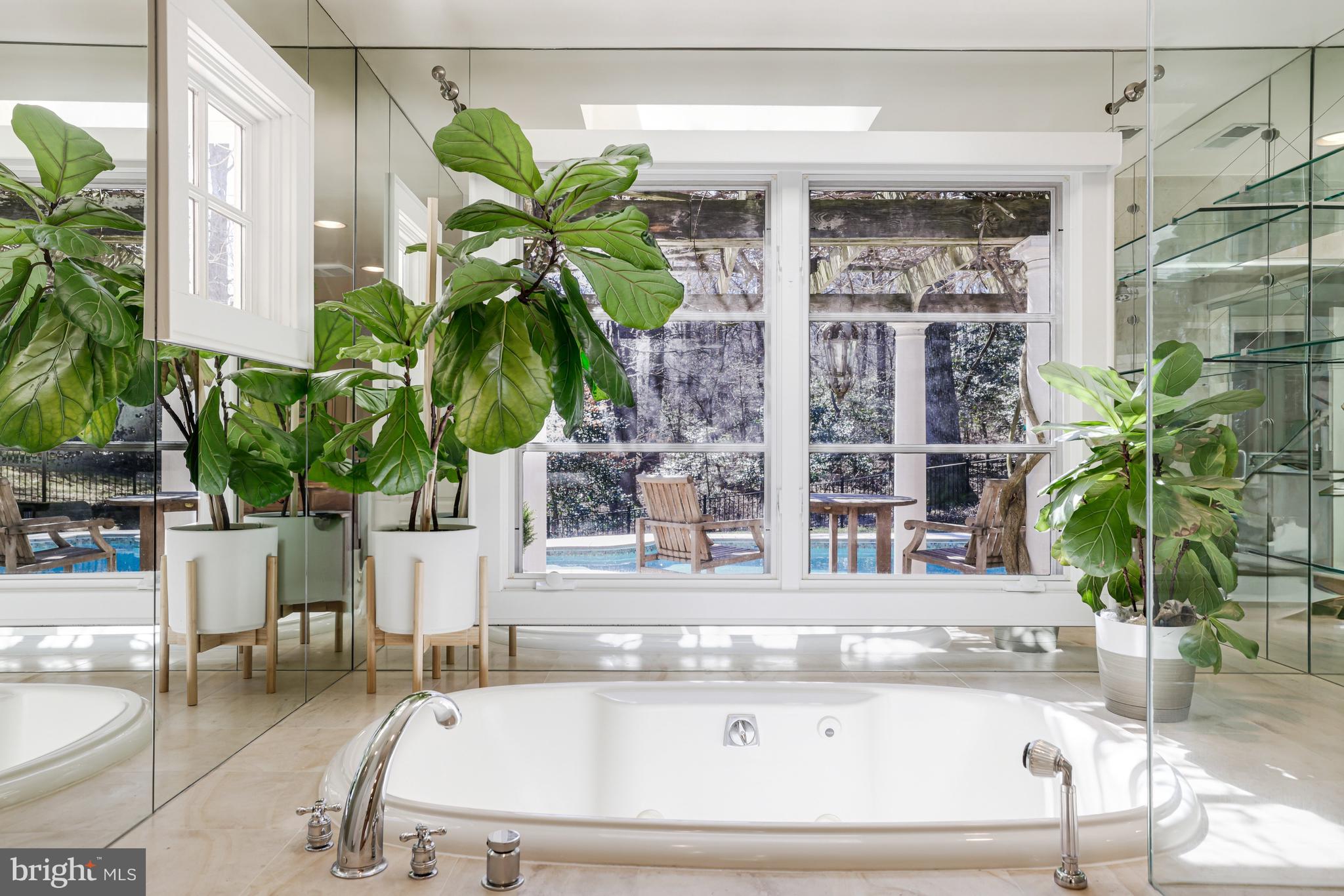 1127 Bellview Road McLean, VA 22102 - Photo 27 of 67 a white bath tub sitting in a bathroom next to a white tub