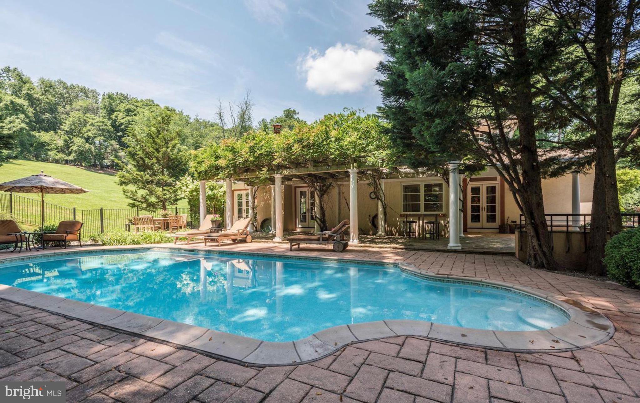 1127 Bellview Road McLean, VA 22102 - Photo 35 of 67 a view of a house with backyard porch and sitting area