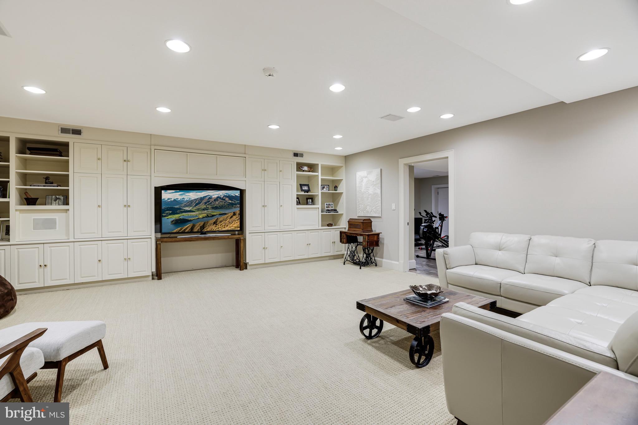 1127 Bellview Road McLean, VA 22102 - Photo 48 of 67 a living room with furniture and a table
