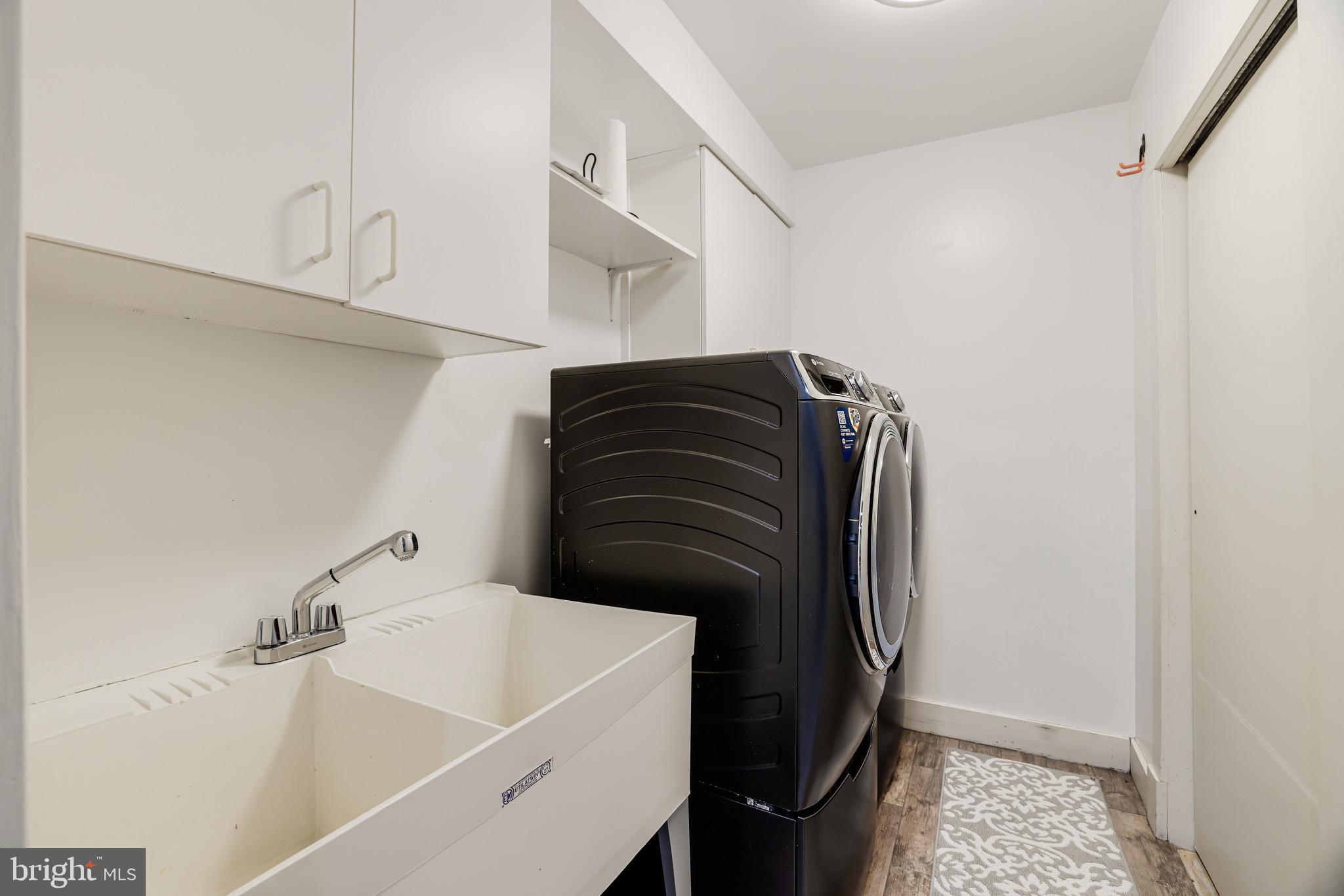 1127 Bellview Road McLean, VA 22102 - Photo 55 of 67 a bathroom with a bathtub and a shower