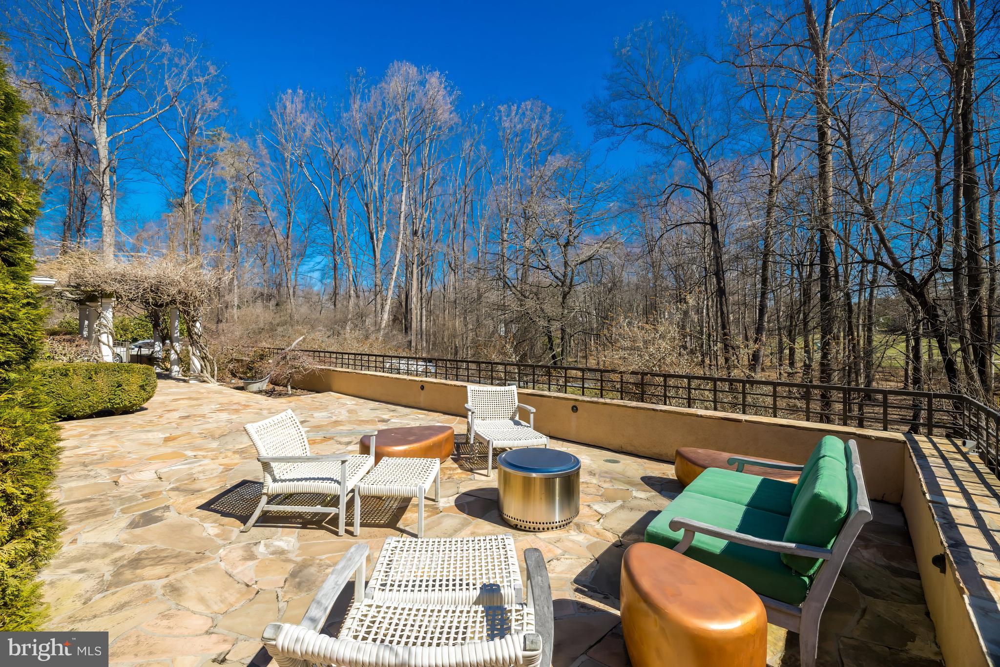 1127 Bellview Road McLean, VA 22102 - Photo 59 of 67 a view of a patio with swimming pool