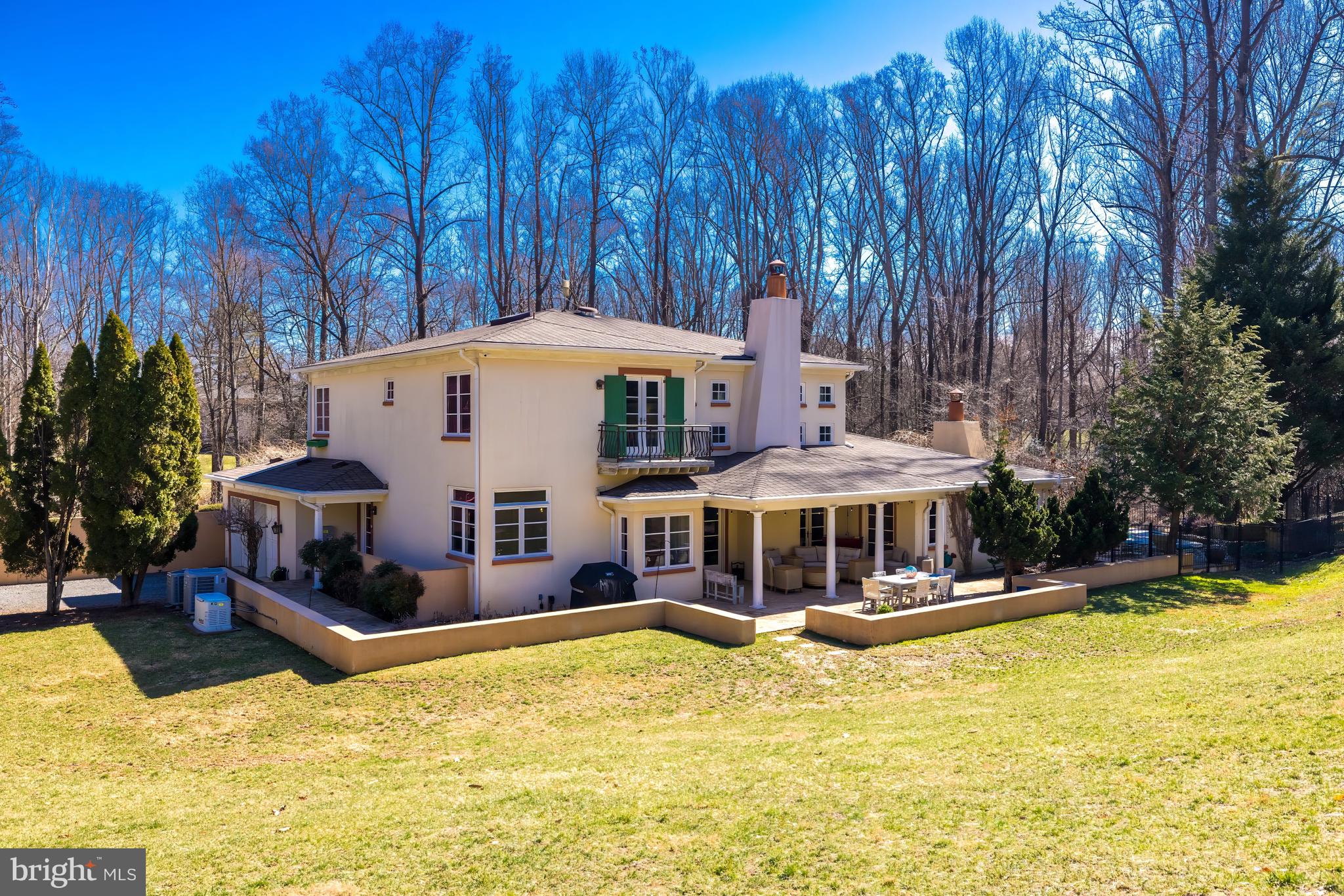 1127 Bellview Road McLean, VA 22102 - Photo 63 of 67 a view of a house with swimming pool and sitting area