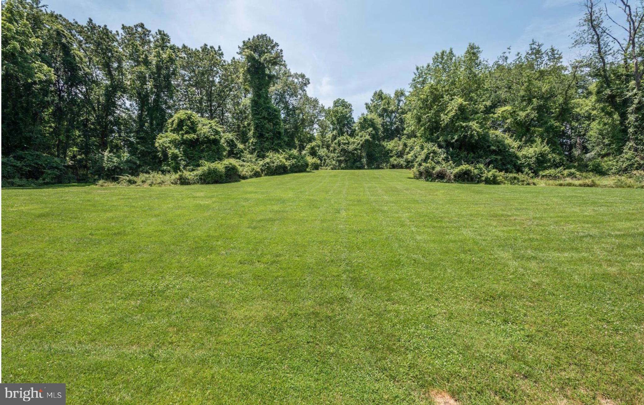 1127 Bellview Road McLean, VA 22102 - Photo 65 of 67 a view of a field with an trees