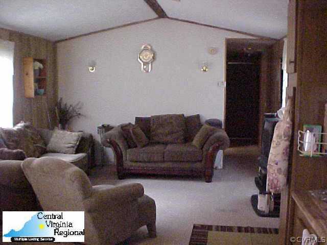 50 Raines Road Farmville, VA 23901 - Photo 2 of 10 a living room with furniture and a flat screen tv