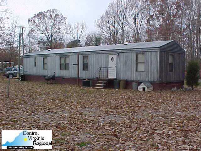 50 Raines Road Farmville, VA 23901 - Photo 6 of 10 a front view of a house with garden