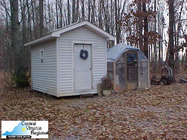 50 Raines Road Farmville, VA 23901 - Photo 7 of 10 a front view of a house with garden