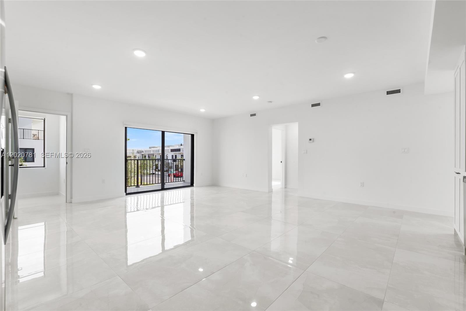 14530 Southwest 261st Terrace, Unit 2 Homestead, FL 33032 - Photo 5 of 23 a view of an empty room