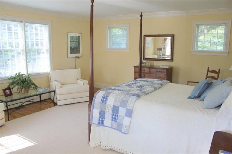 56 Farm Valley Road Osterville, MA 02655 - Photo 11 of 23 a bedroom with a bed couch and window