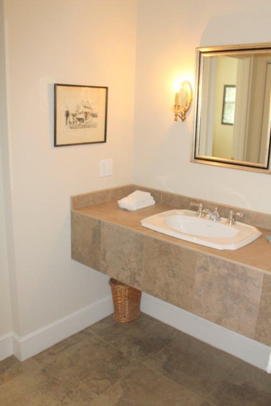 56 Farm Valley Road Osterville, MA 02655 - Photo 13 of 23 a bathroom with a sink and a mirror
