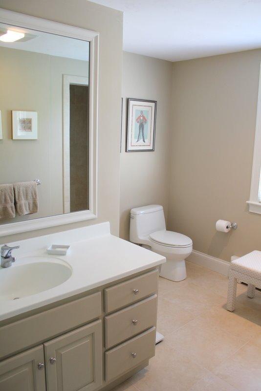 56 Farm Valley Road Osterville, MA 02655 - Photo 15 of 23 a bathroom with a toilet sink and mirror