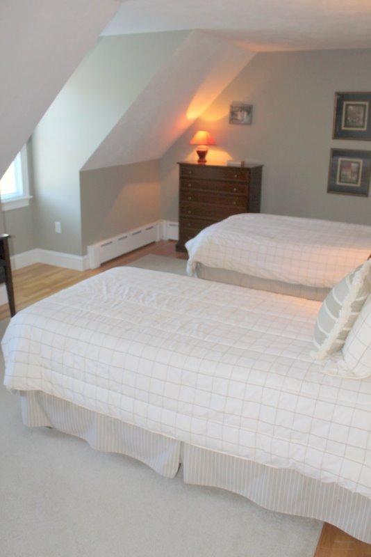 56 Farm Valley Road Osterville, MA 02655 - Photo 16 of 23 a bedroom with a bed and a night stand