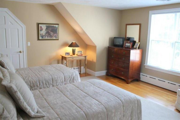56 Farm Valley Road Osterville, MA 02655 - Photo 17 of 23 a bedroom with a bed dresser and a window