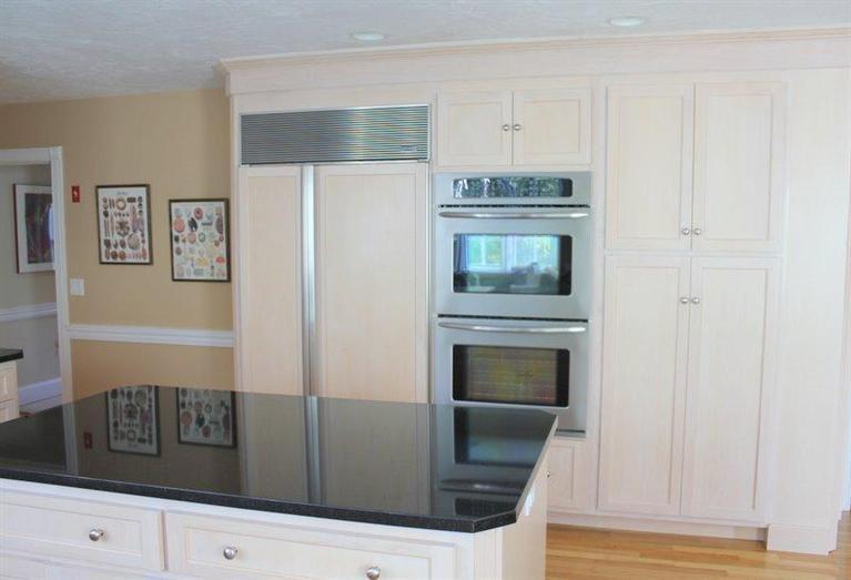56 Farm Valley Road Osterville, MA 02655 - Photo 3 of 23 a kitchen with granite countertop white cabinets and white appliances