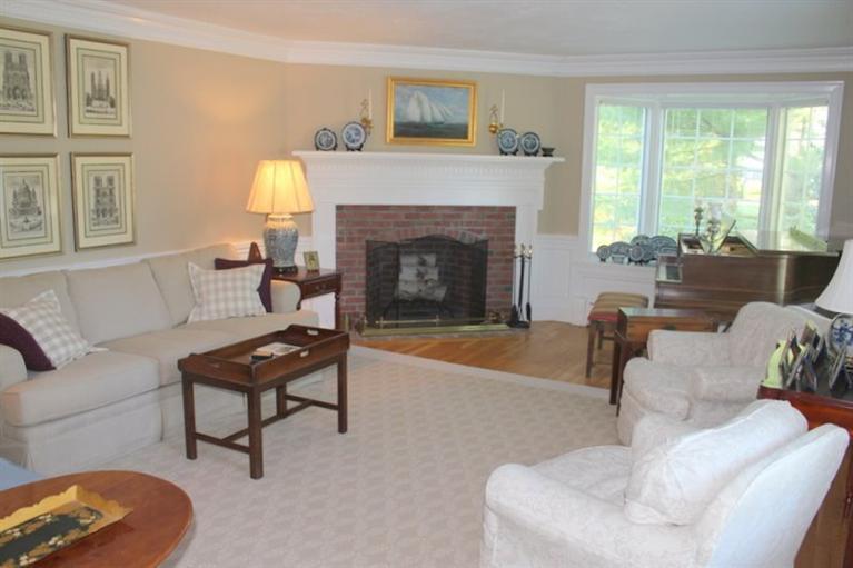 56 Farm Valley Road Osterville, MA 02655 - Photo 5 of 23 a living room with furniture and a fireplace