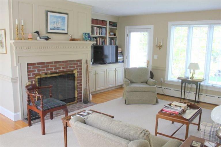 56 Farm Valley Road Osterville, MA 02655 - Photo 6 of 23 a living room with furniture and a fireplace