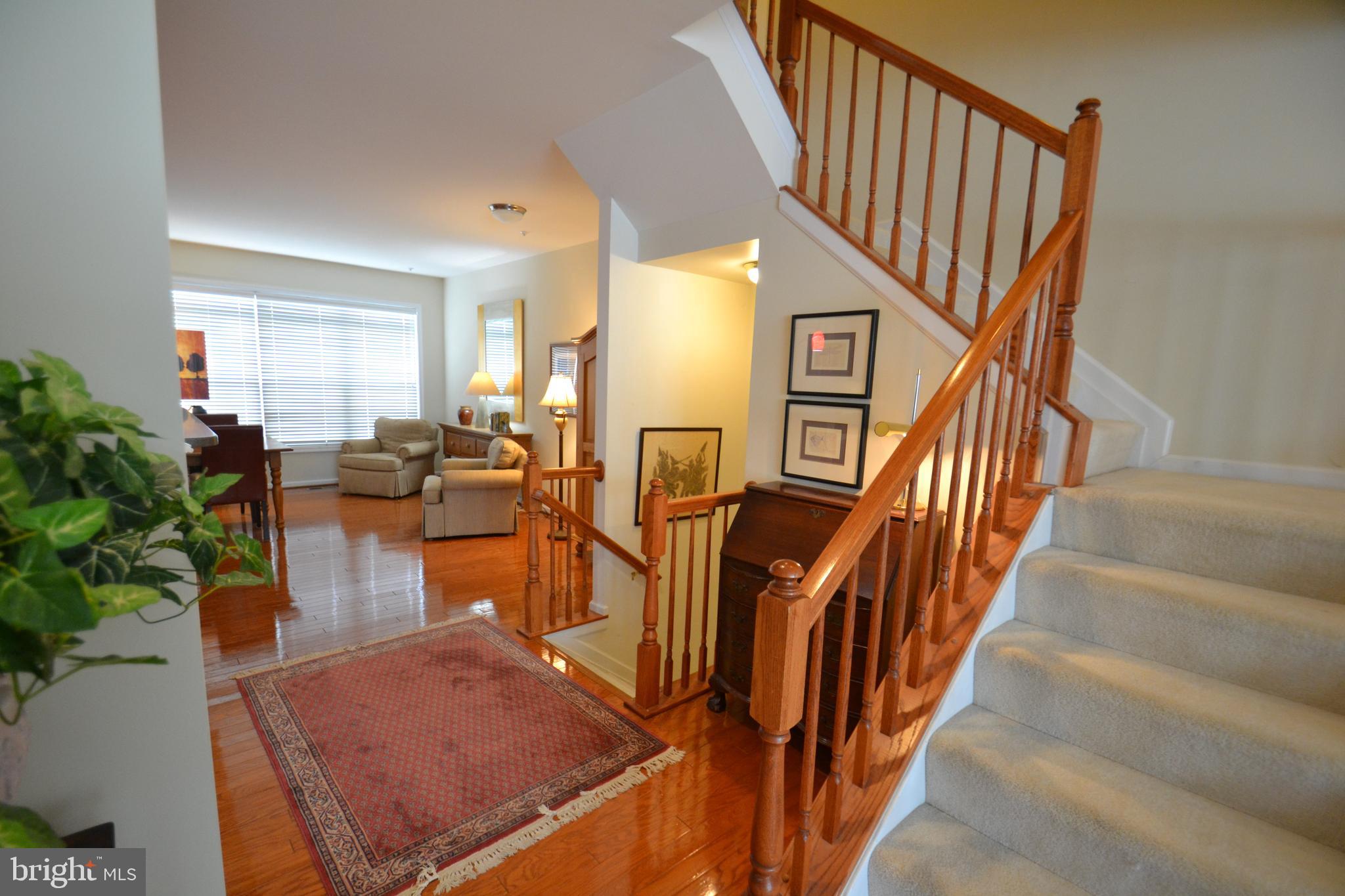 10207 Rutland Round Road, Unit 65 Columbia, MD 21044 - Photo 12 of 32 Transition from family room to Kitchen/dining
