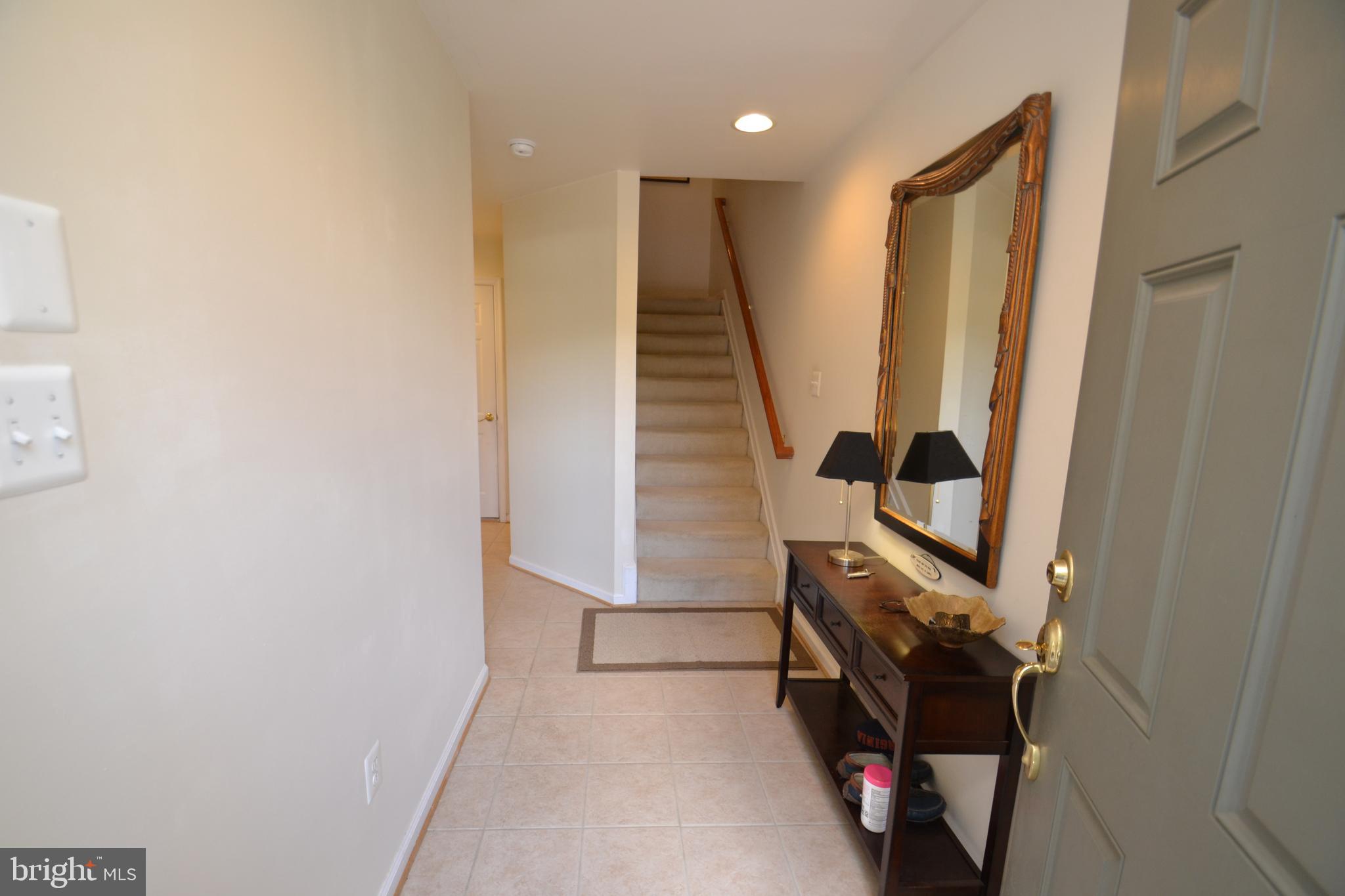 10207 Rutland Round Road, Unit 65 Columbia, MD 21044 - Photo 2 of 32 Entry level foyer