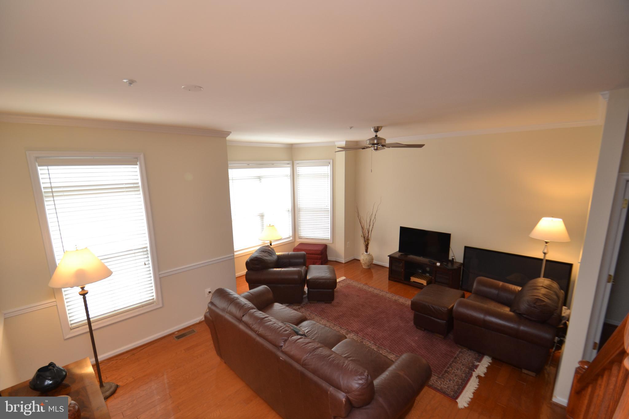 10207 Rutland Round Road, Unit 65 Columbia, MD 21044 - Photo 10 of 32 Plenty of room for large furniture - main level FR