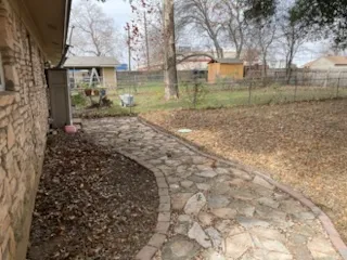 a view of backyard with green space